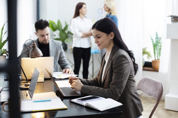 medium-shot-woman-working-office